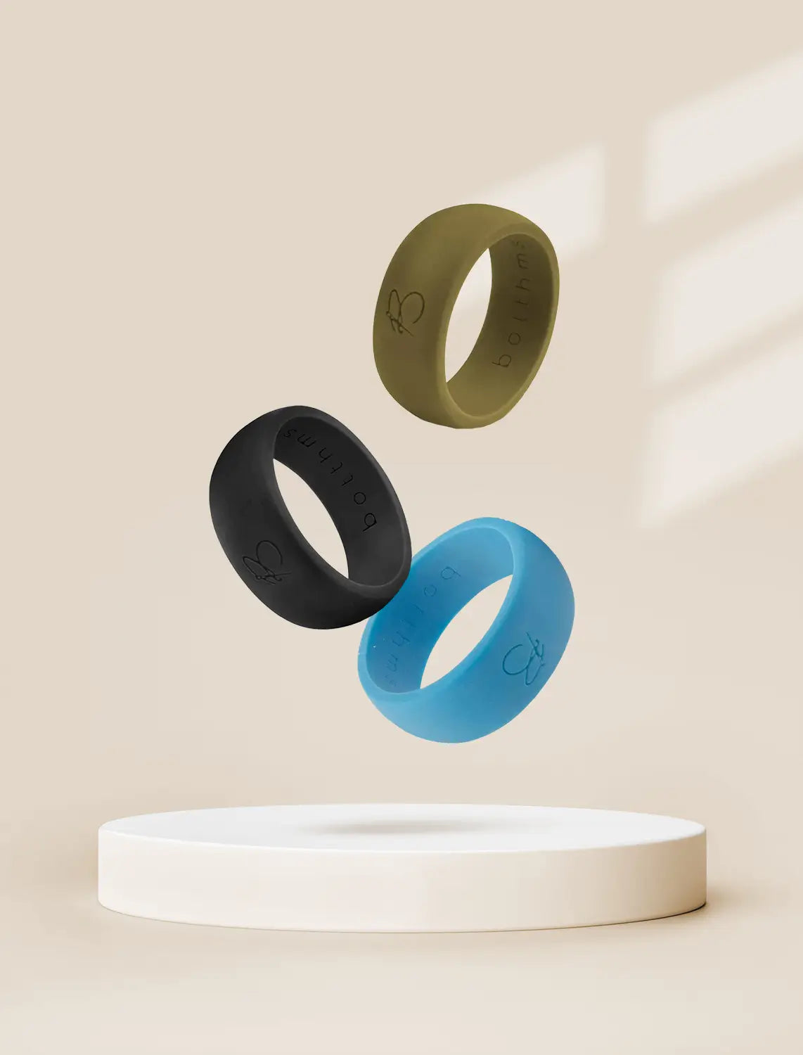 botthms brown, black and turquoise silicone rings